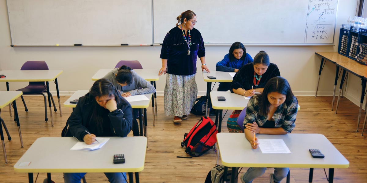 a teacher in a classroom with students