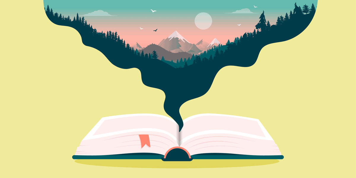 an open book with a mountain landscape eminating from it