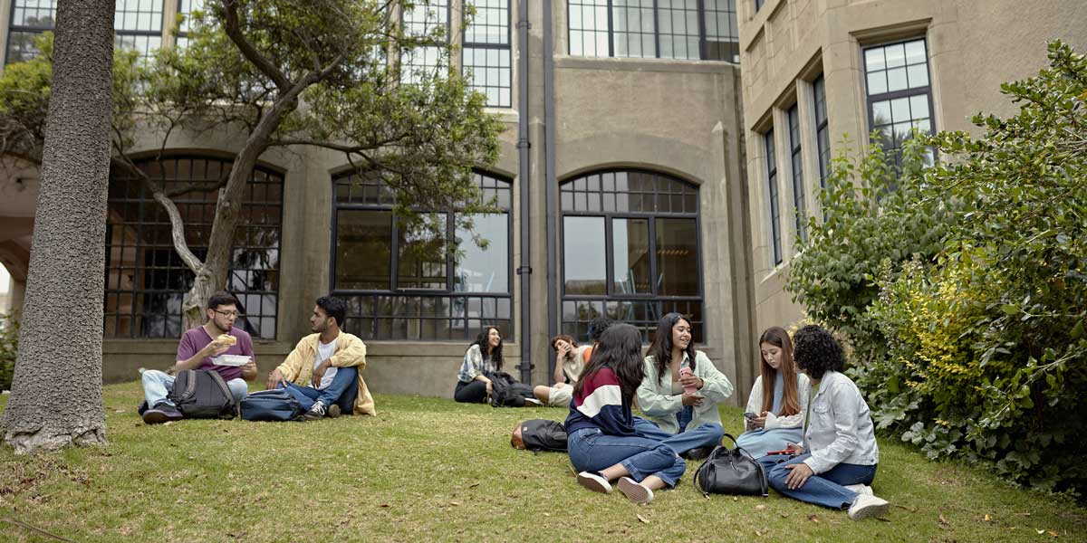 college students in front of a school