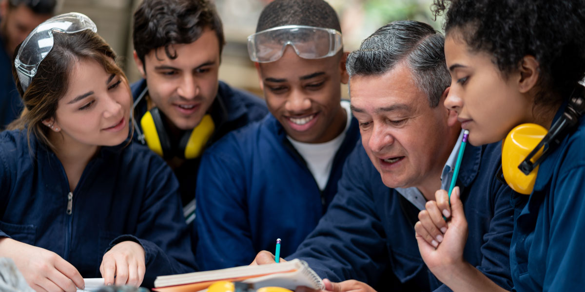 A group of student with safety headphones and goggles