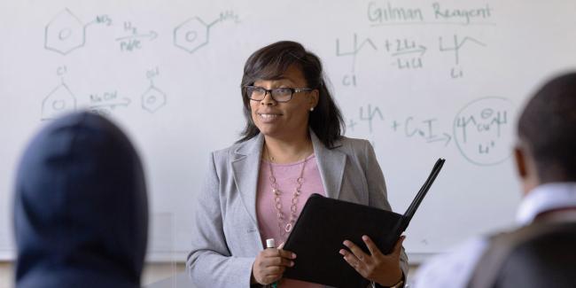 teacher in front of a classroom